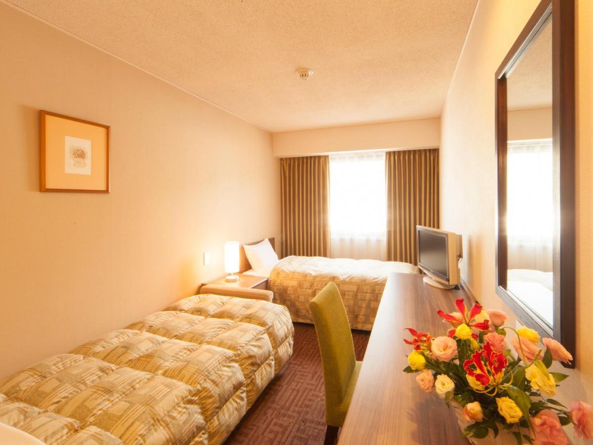 Hotel Pearl City Kesennuma Kamer foto