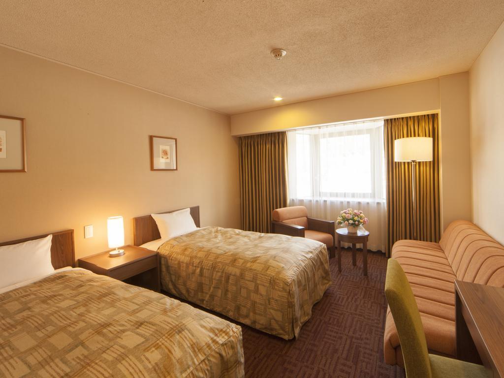 Hotel Pearl City Kesennuma Kamer foto