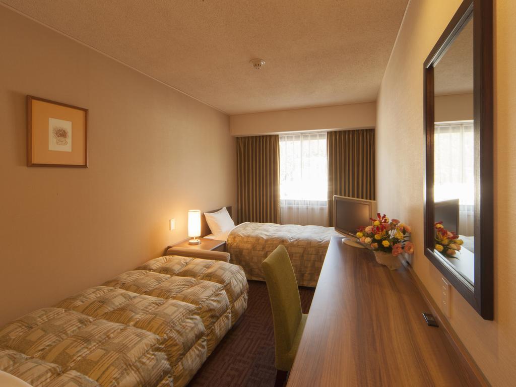 Hotel Pearl City Kesennuma Kamer foto